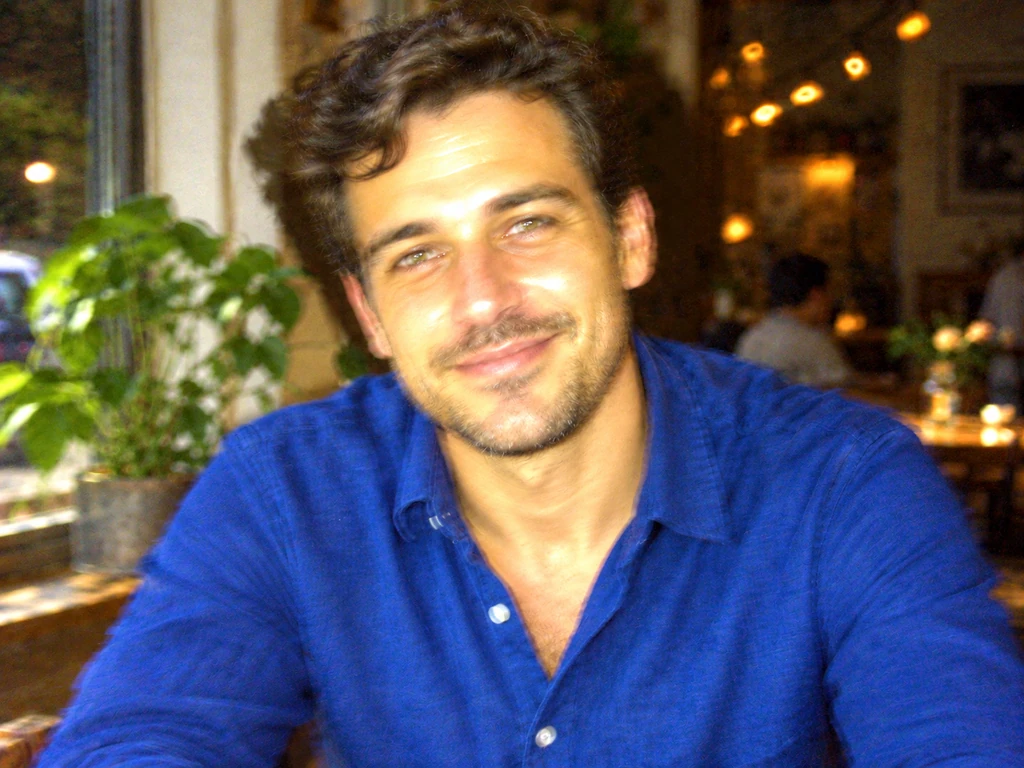 The same man photographed with harsh flash glare, sickly skin tones, dark shadows, and blurred detail